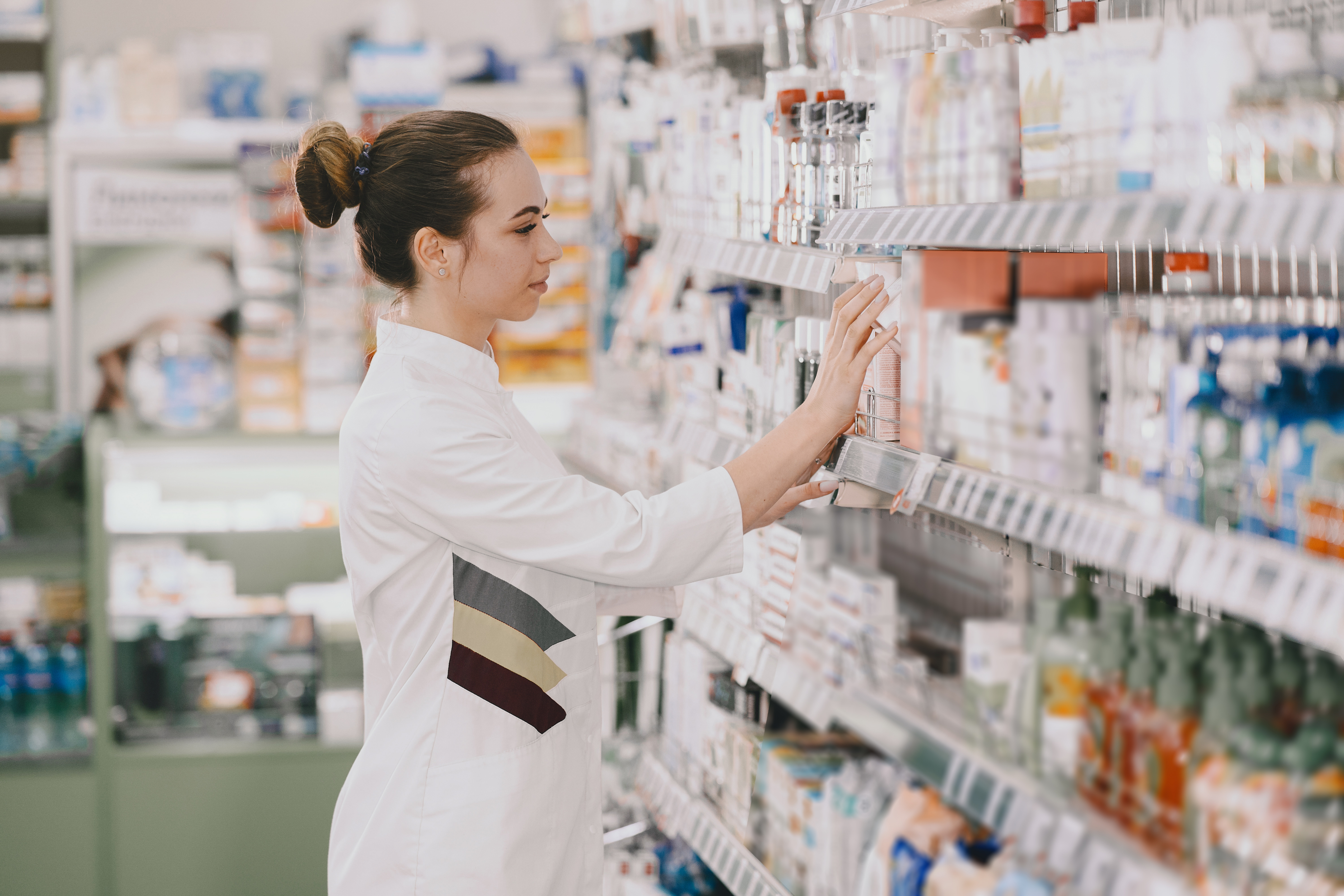 Woman pharmacist checking medicine